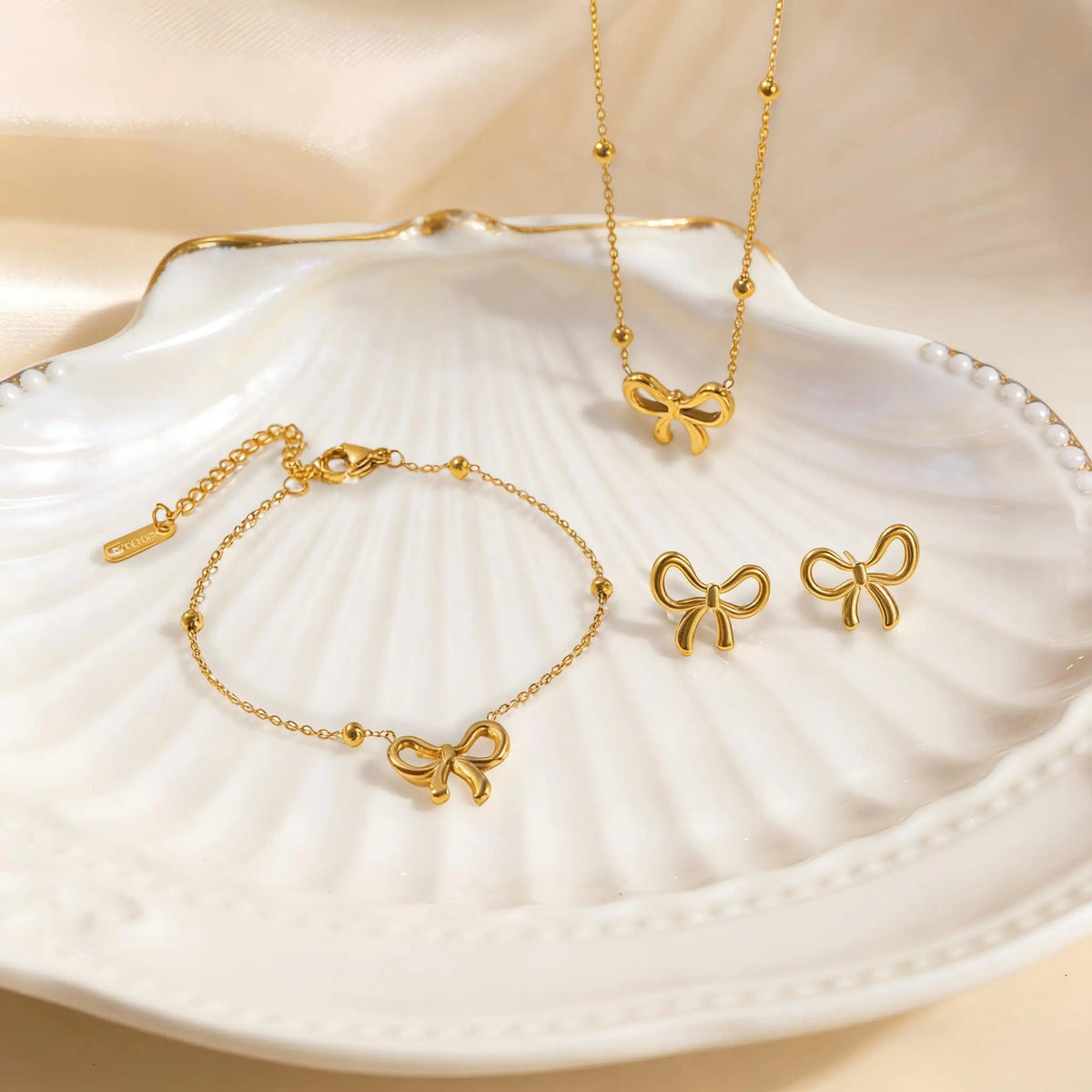 Gold Bowknot Jewelry Set for Women – Necklace, Bracelet & Earrings