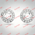 A pair of round stud earrings with a silver-toned halo setting and clear crystals, shown on a light gray background with a repeating watermark pattern.