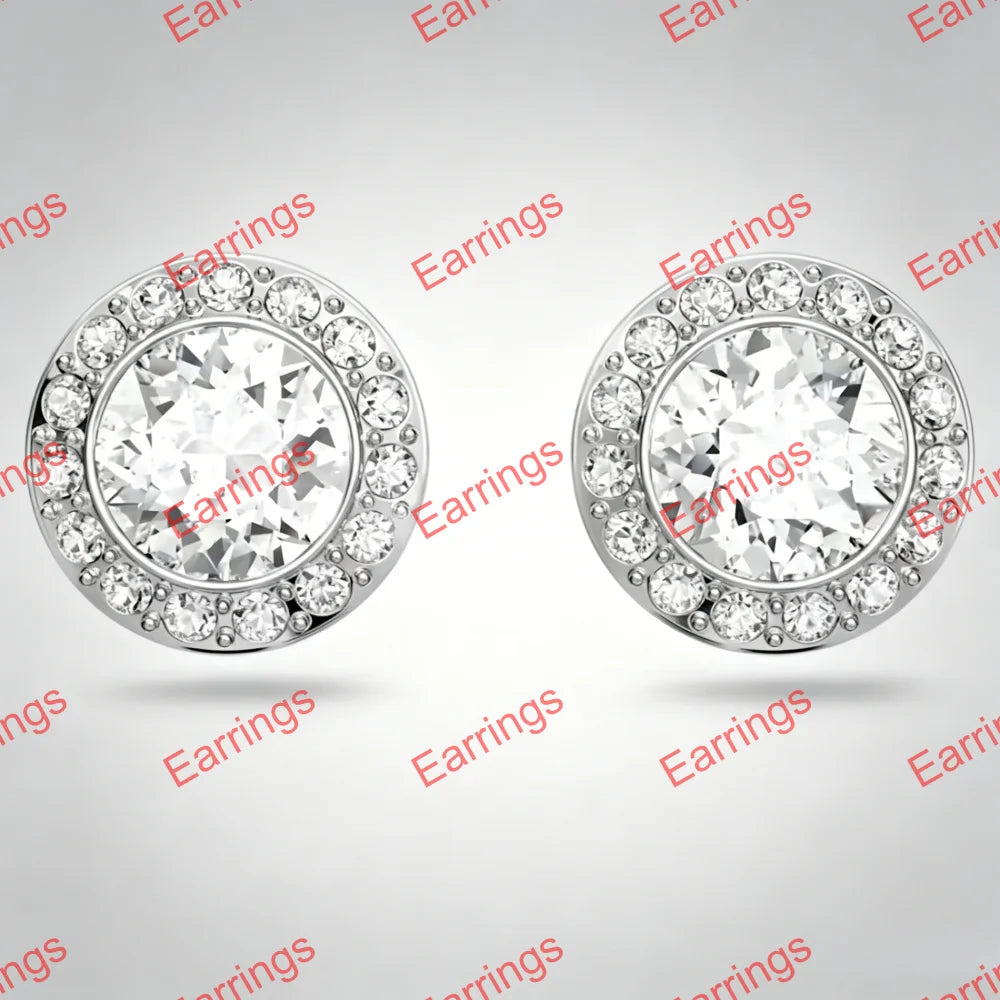 A pair of round stud earrings with a silver-toned halo setting and clear crystals, shown on a light gray background with a repeating watermark pattern.