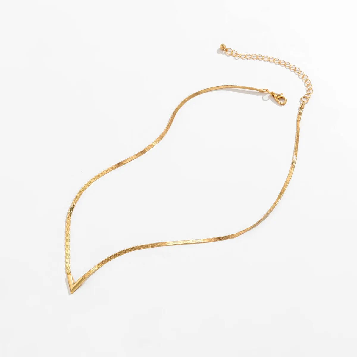 Gold necklace on a white background